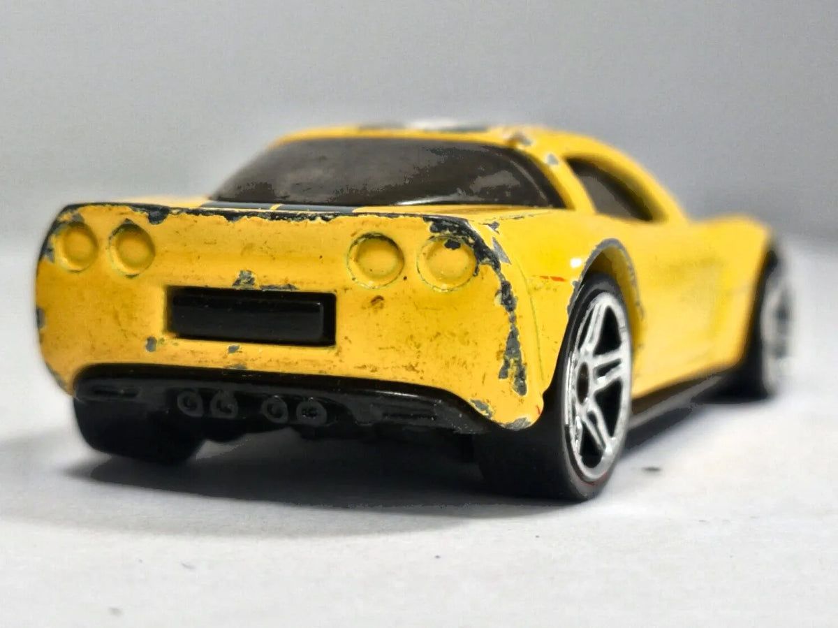 '12 CORVETTE Z06 Hot Wheels 2012 Żółty 1:64 – zdjęcie 6