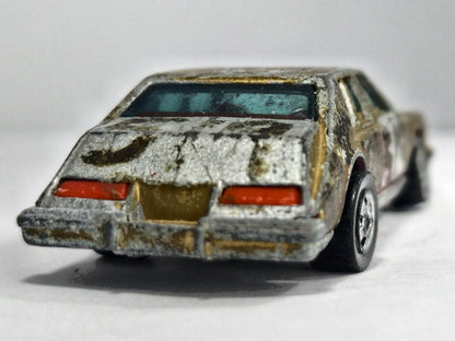 CADILLAC SEVILLE Hot Wheels 1990 Złoty 1:60 – zdjęcie 6
