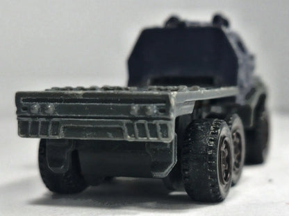 Ciężarówka Armored Action Transporter Wojsko Matchbox 2017 Granatowy 1:64 – zdjęcie 6