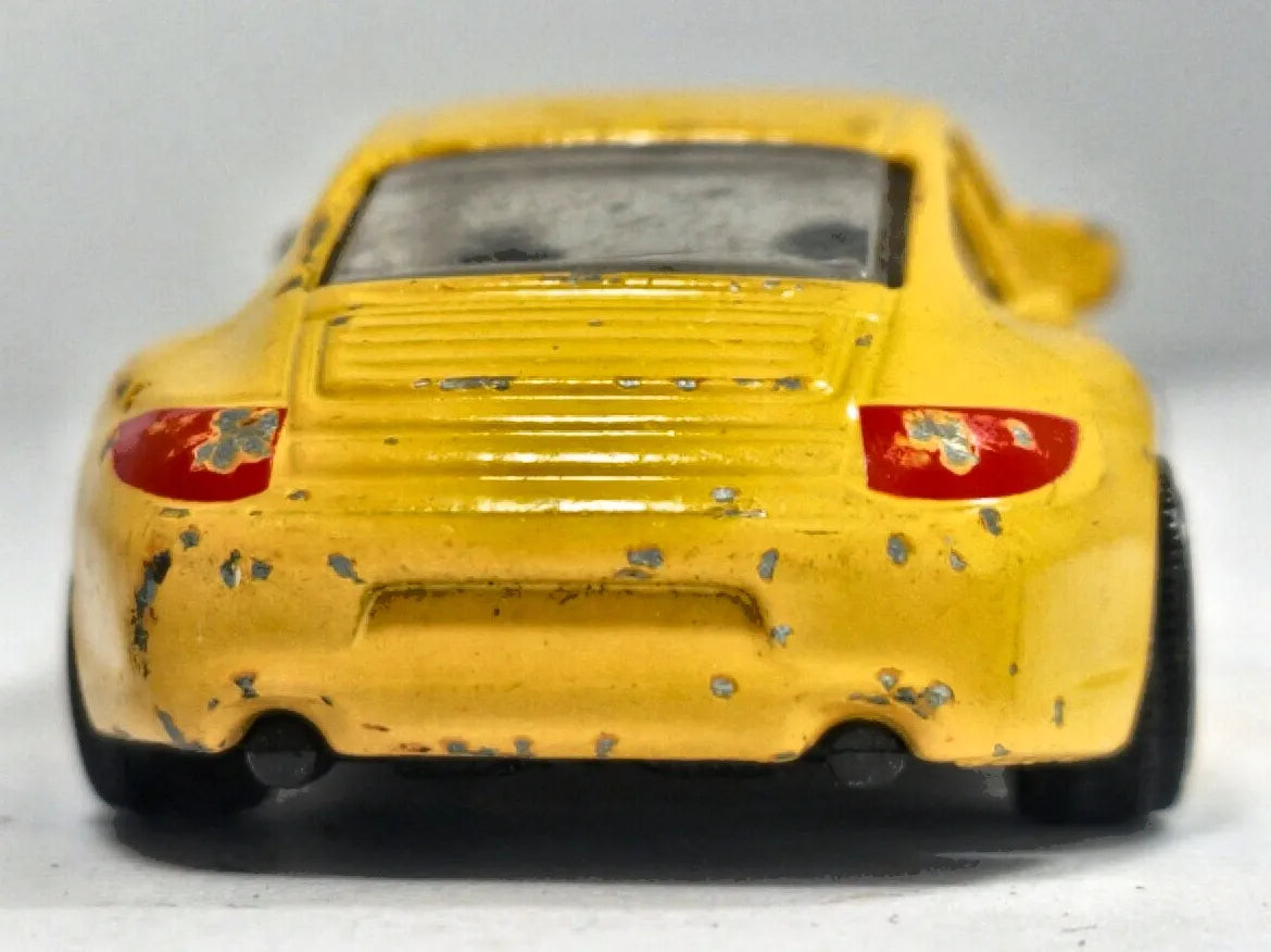 Porsche 911 Carrera Majorette 2001 1:58 Luzak Żółty – zdjęcie 6