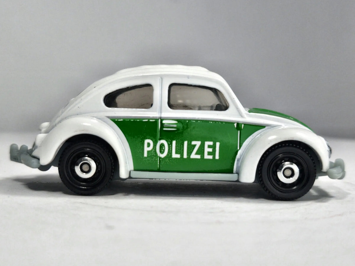 '62 Volkswagen Beetle Mainline Policja Matchbox 1998 Biały 1:55 – zdjęcie 4