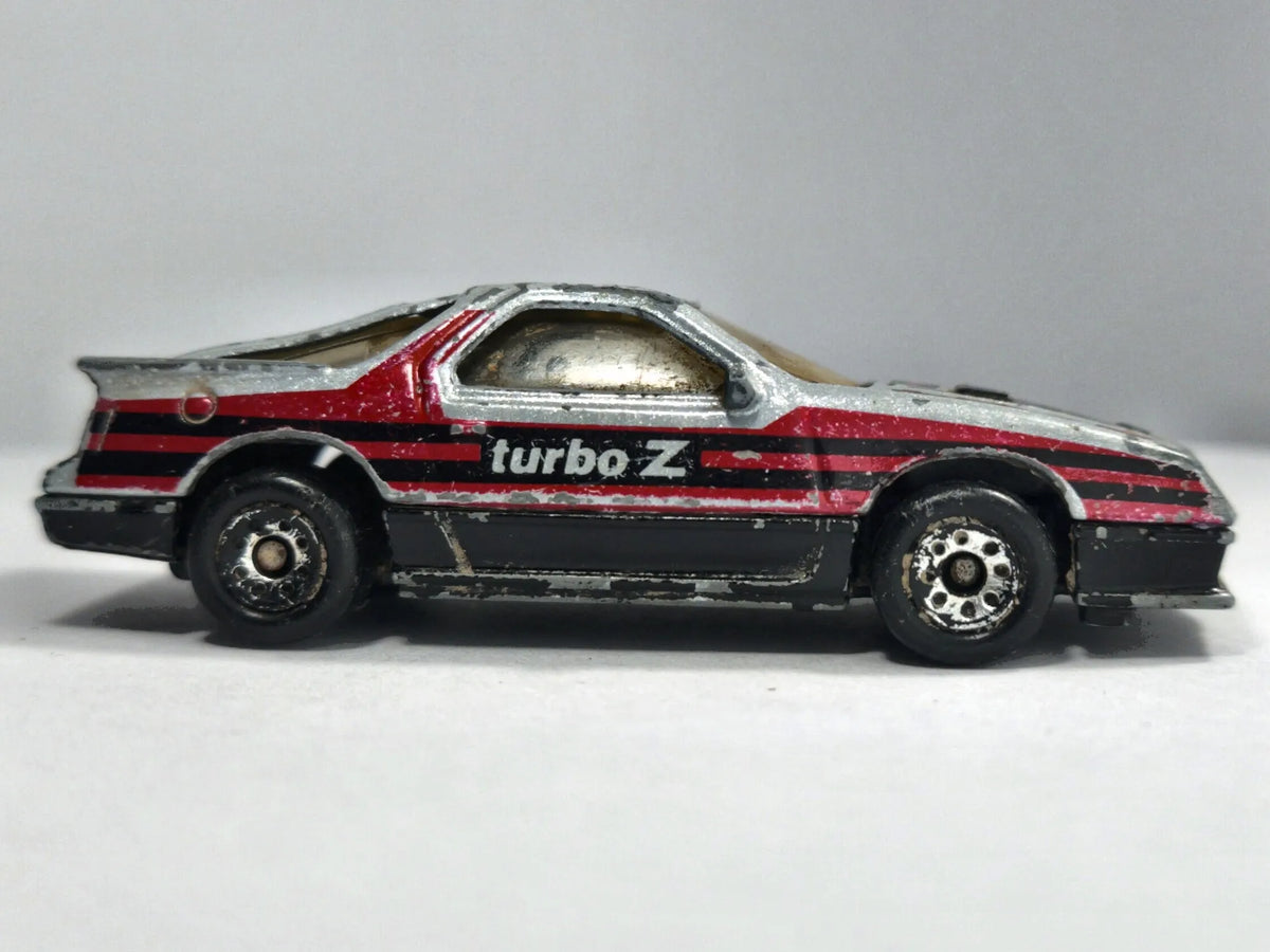 1984 DODGE DAYTONA TURBO Z, Matchbox, Die cast, Srebrny, 1:64, Resoraki – zdjęcie 4
