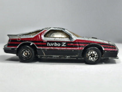 1984 DODGE DAYTONA TURBO Z, Matchbox, Die cast, Srebrny, 1:64, Resoraki – zdjęcie 4