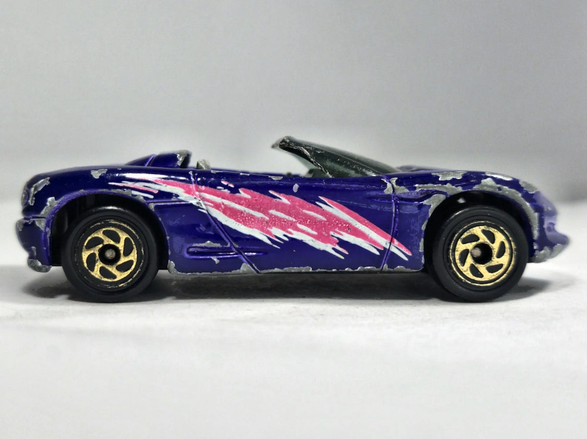 Chevrolet Corvette Sting Ray Matchbox 1994 1:64 Luzak Fioletowy – zdjęcie 4