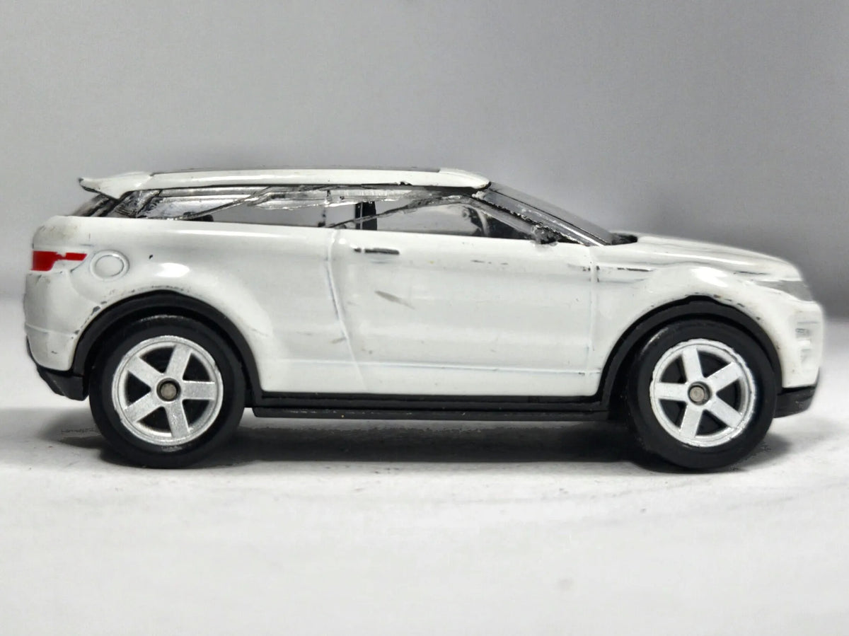 Range Rover Evoque Welly 1:64 Luzak Biały – zdjęcie 4