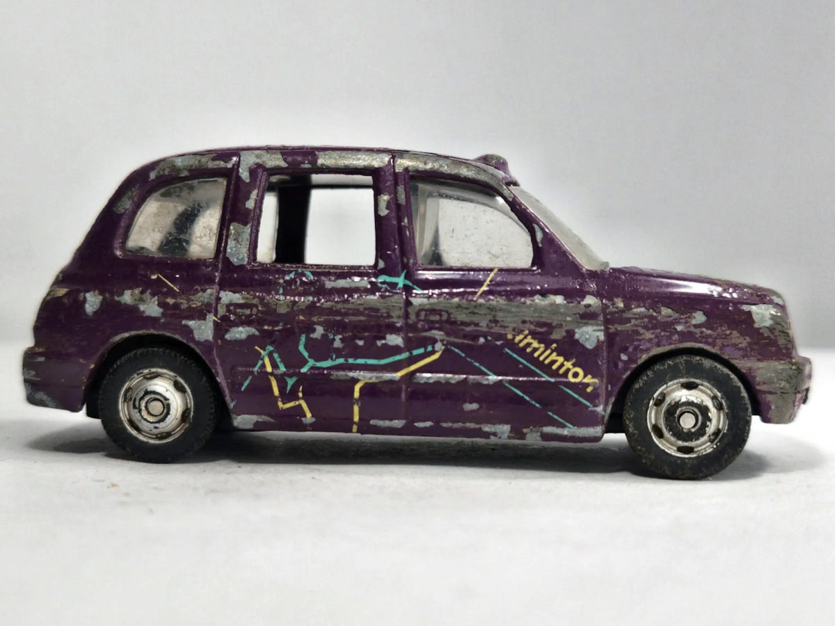 TX1 TAXI London Taxi Corgi 2007 Fioletowy 1:53 – zdjęcie 4