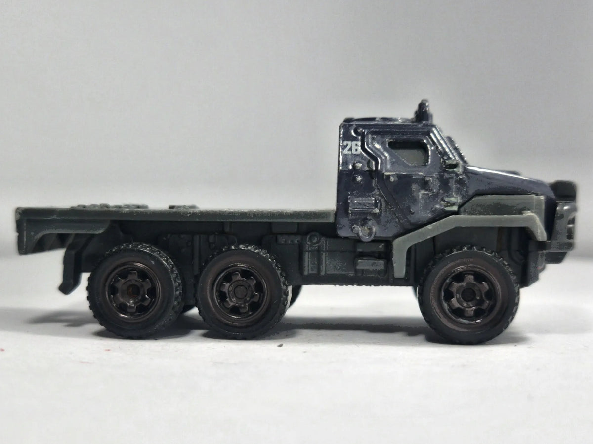 Ciężarówka Armored Action Transporter Wojsko Matchbox 2017 Granatowy 1:64 – zdjęcie 4