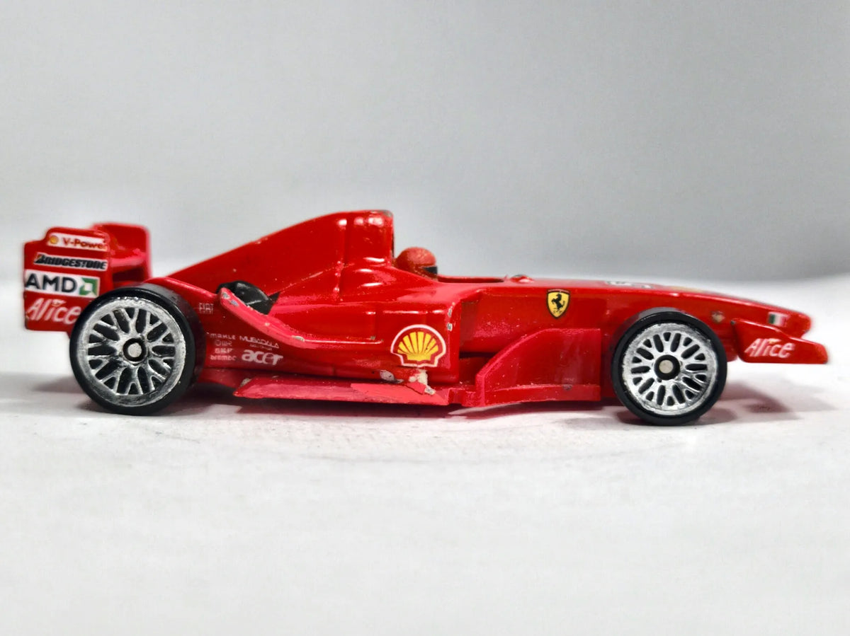Ferrari F2002 Bburago 1:57 Bolid F1 Czerwony Formuła 1 Michael Schumacher – zdjęcie 4