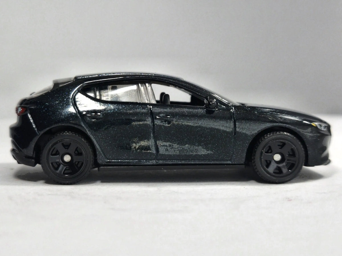 Mazda 3 (Bp) Hatchback Matchbox 1:64 Ciemny zielony Samochód osobowy – zdjęcie 4