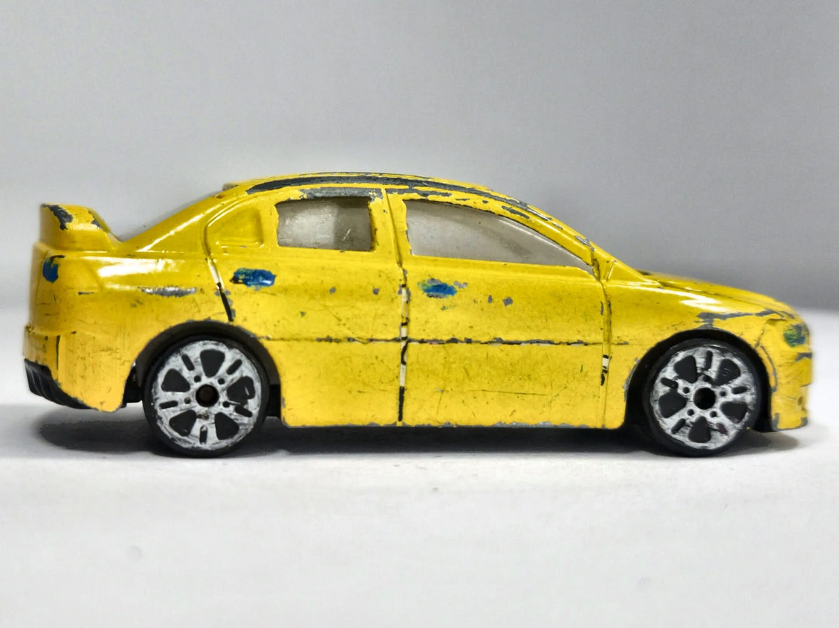Mitsubishi Lancer Evolution 1:56 Luzak Żółty – zdjęcie 4