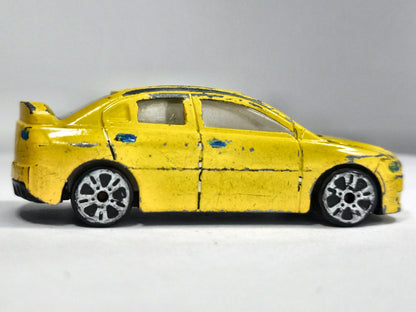 Mitsubishi Lancer Evolution 1:56 Luzak Żółty – zdjęcie 4