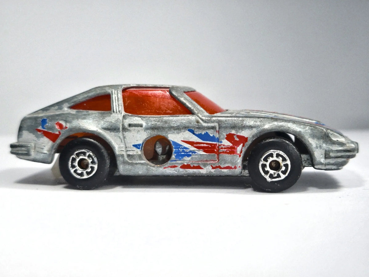 Datsun 280ZX 2+2 MEGA BLASTERS, Matchbox 1983, Die cast, 1:64, Resoraki – zdjęcie 4