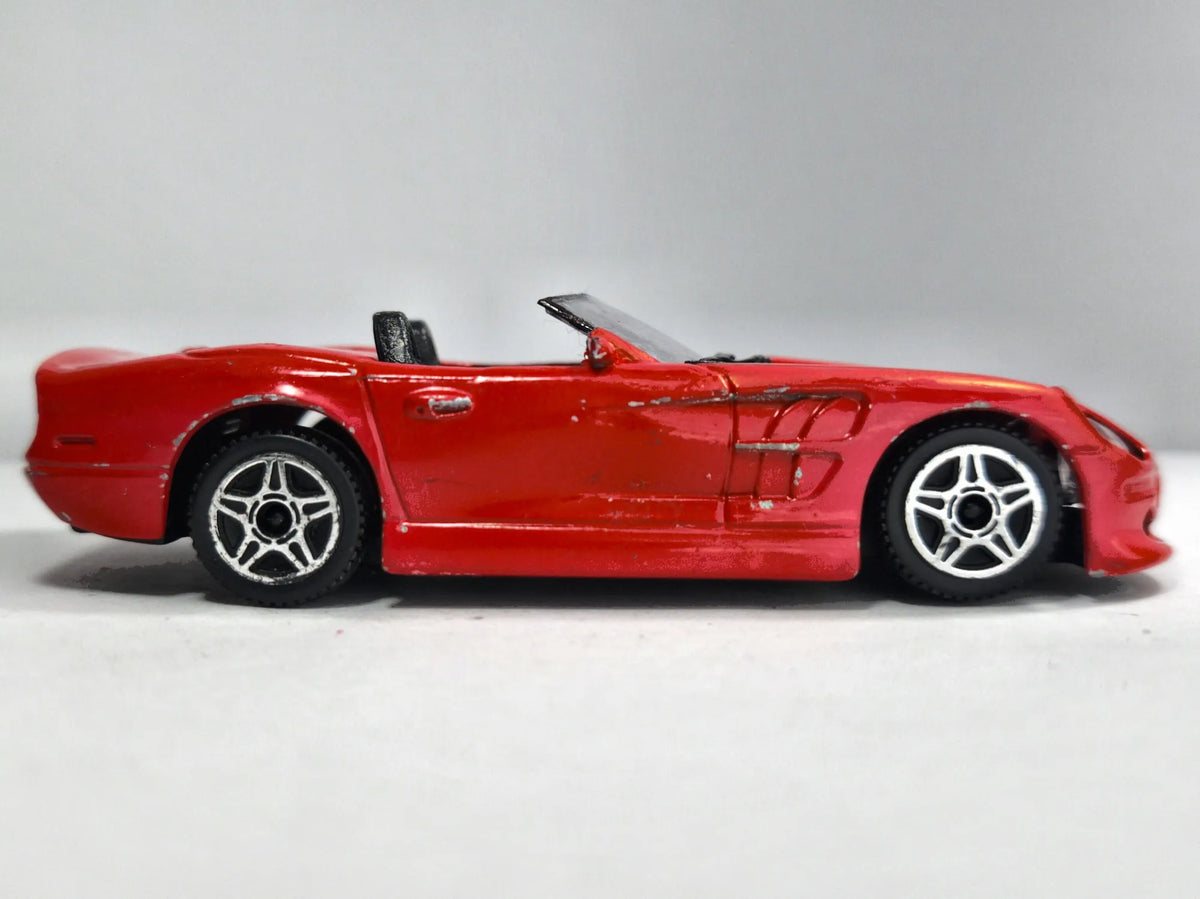 SHELBY SERIES 1 CABRIO Bburago Made in Italy Czerwony 1:43 – zdjęcie 4