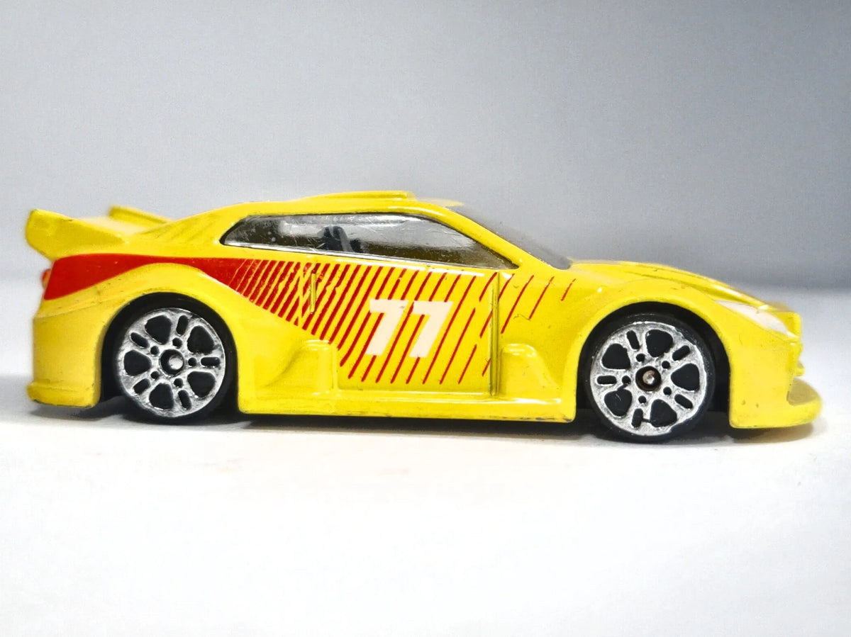 FUTURYSTYCZNY SAMOCHÓD WYŚCIGOWY Delta-Sport Made in Germany Żółty 77, 1:64 – zdjęcie 4