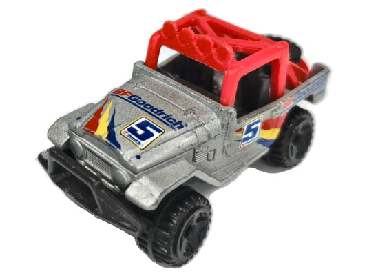 Jeep Scrambler Hot Wheels 2006 1:64 Jeep BFGoodrich Luzak Srebrny