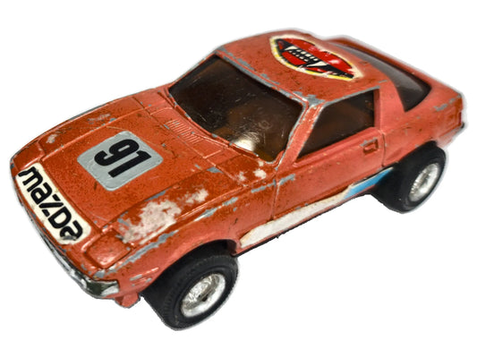 MAZDA RX-7 Z SERII 200 1983 Pomarańcz. 1:45 Made in Konk Kong Vintage Model