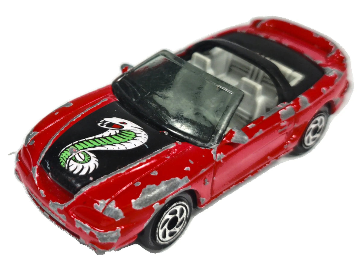 Mustang Cobra Matchbox 1993 1:64 Luzak Czerwony