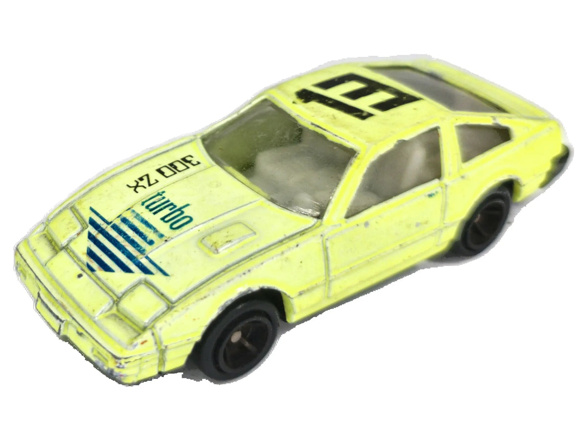 Nissan 300ZX Turbo Yatming 1:64 turbo #13 Luzak Żółty Jaskrawy