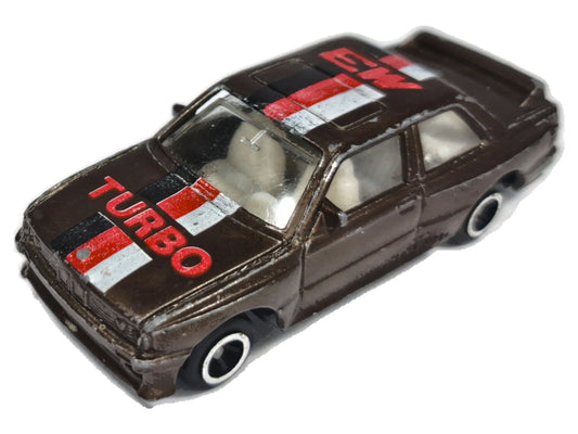 BMW 320i Turbo Rally Pioneer 1:64 Luzak Brązowy