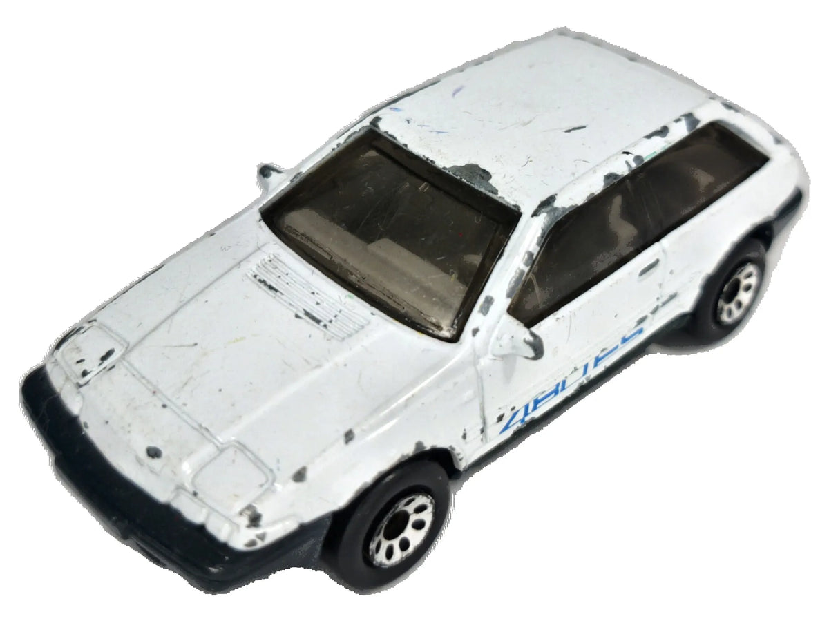VOLVO 480 ES Policja Matchbox 1987 Biały 1:54 Made in Macau