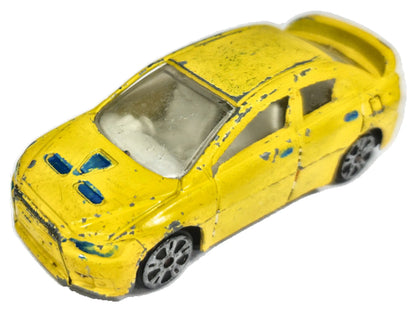 Mitsubishi Lancer Evolution 1:56 Luzak Żółty