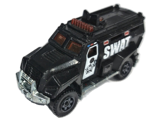 S.W.A.T. Truck Matchbox 2011 1:64 Opancerzony Samochód SWAT Luzak Policja