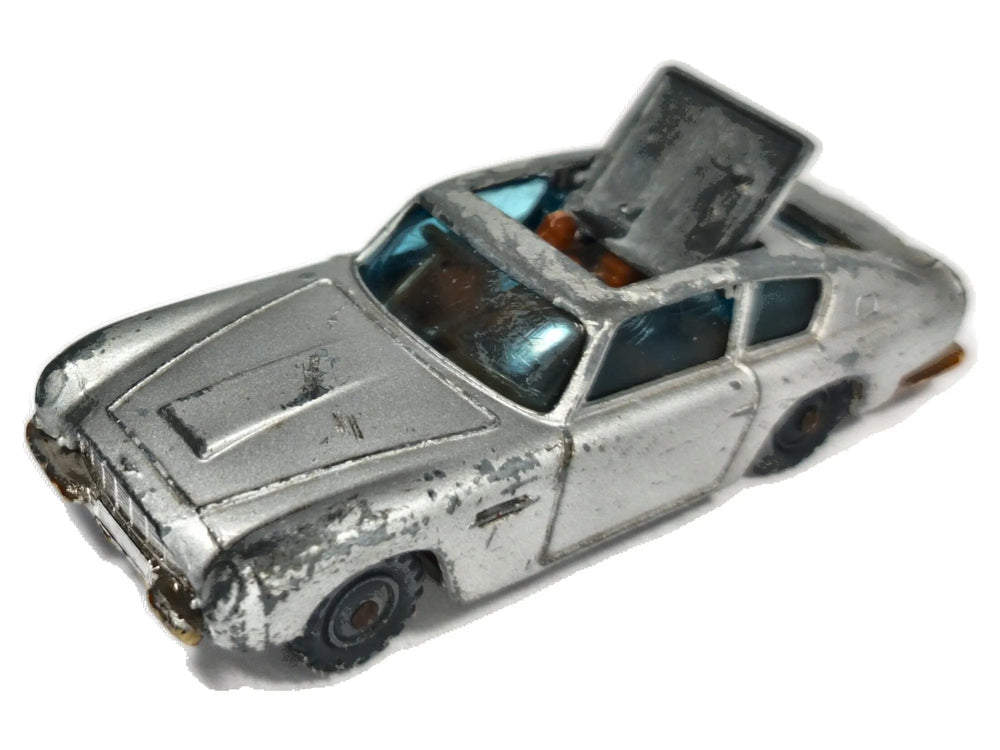 JAMES BONDS ASTON MARTIN Husky '50 Srebrny 1:64 Made in Gt Britain