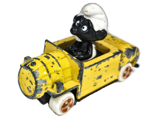 Figurka "Czarnego Smerfa" ESCI Puffi Cars 1979 Żółty 1:43 Made in Italy