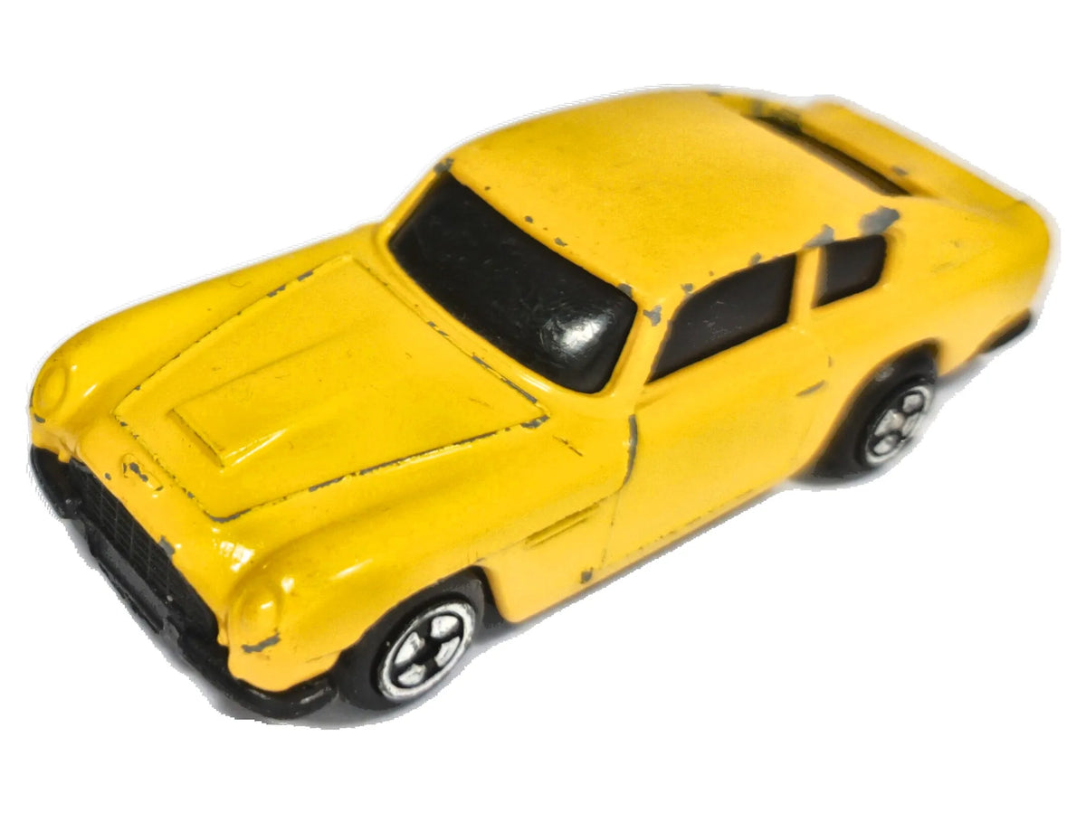 Aston Martin DB6 Corgi Żółty 1:64