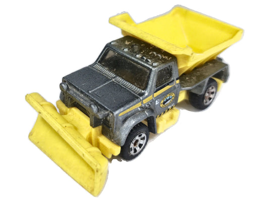 Snow Thrasher Matchbox 2014 MBX Construction 1:64 Wywrotka Luzak Żółty