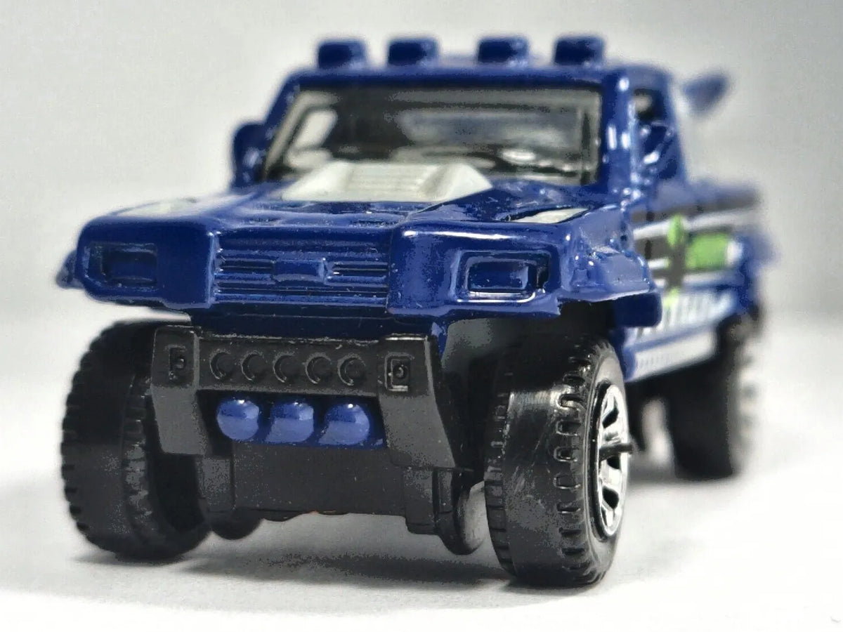 RIDGE RAIDER, DINOM8X, Matchbox 2006 Die cast M8716 Niebieski 1:64 Resoraki – zdjęcie 5