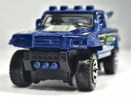 RIDGE RAIDER, DINOM8X, Matchbox 2006 Die cast M8716 Niebieski 1:64 Resoraki – zdjęcie 5