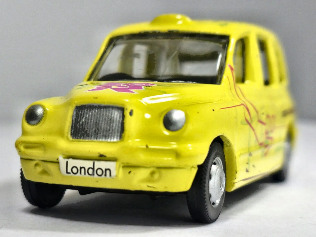 LONDON TAXIS TX1 TAX1 Corgi 2007 Żółty 1:52 – zdjęcie 5