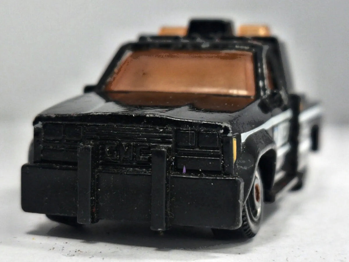 GMC Wrecker Matchbox 1987 Matchbox Series 1:64 Pomoc drogowa NYPD Luzak – zdjęcie 5