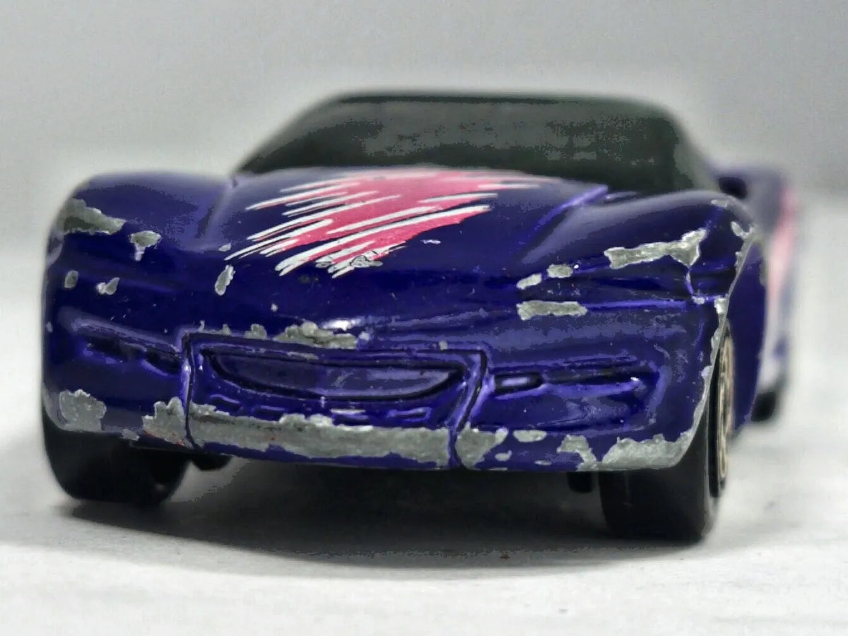 Chevrolet Corvette Sting Ray Matchbox 1994 1:64 Luzak Fioletowy – zdjęcie 5