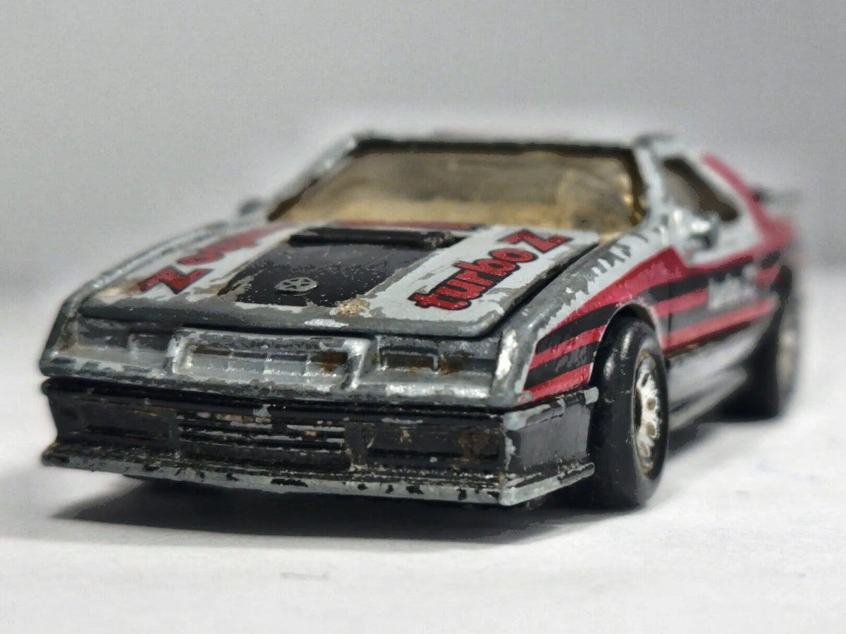 1984 DODGE DAYTONA TURBO Z, Matchbox, Die cast, Srebrny, 1:64, Resoraki – zdjęcie 5